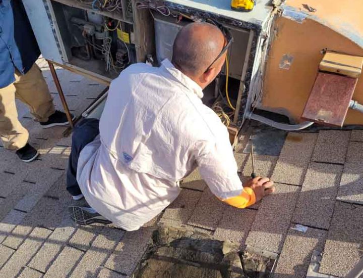 A skilled technician working on an air conditioner repair
